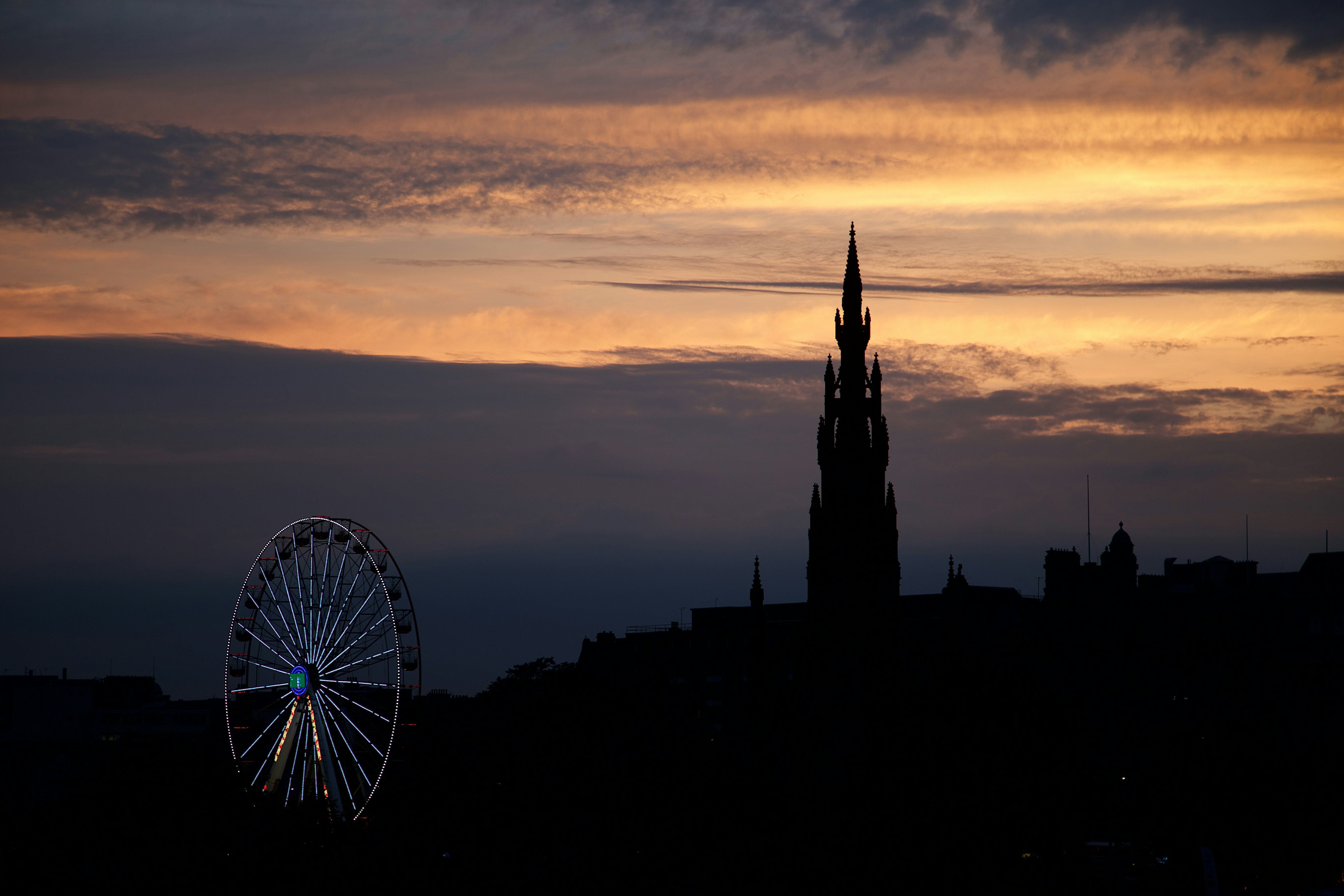 silhouette of windmill during sunset